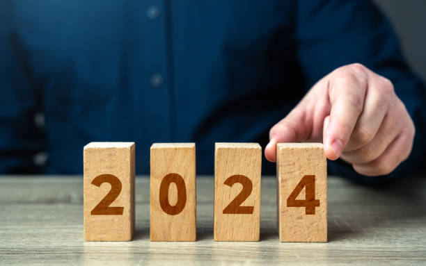 istock Setting up goal 2024 from blocks. Happy new year. Embracing new trends, making forecasts, setting plans for coming future. Great beginnings and opportunities. 2179274992