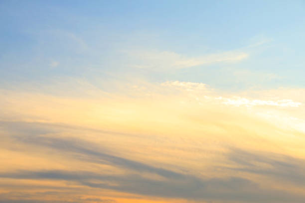 Evening sky with soft blur effect, featuring calm hues for use in background designs or peaceful themes