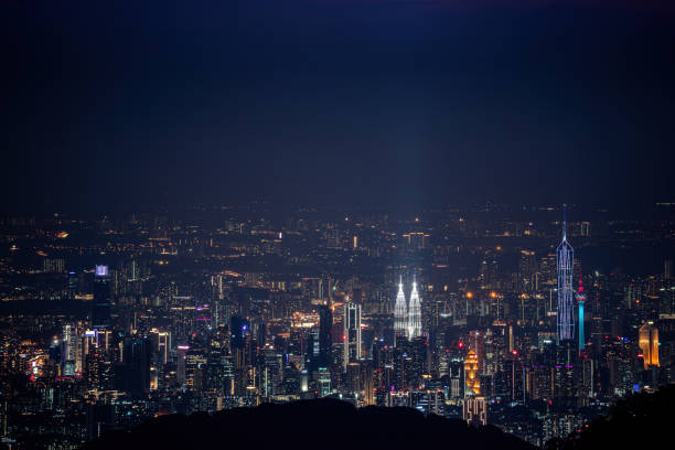 Viewing the urban city of Kuala Lumpur from far mountains