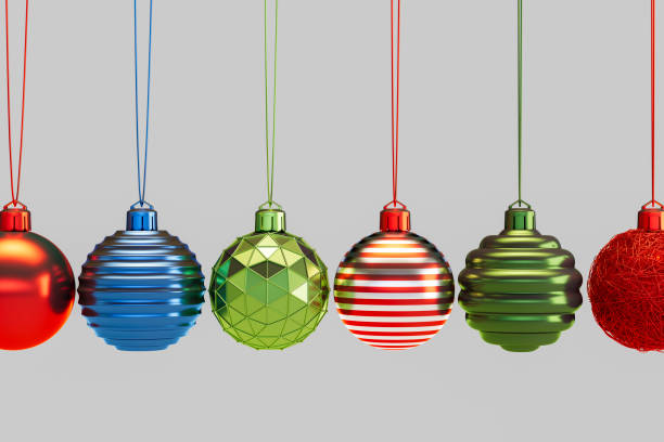 istock Christmas Ornaments on Gray Background with Newton's Cradle Style 2179302542