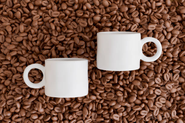 Roasted coffee beans with white color mug. Digitally generated image. 3d render.