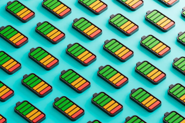 istock Batteries on blue background. Sustainable resources, electric vehicle battery. 2179312514