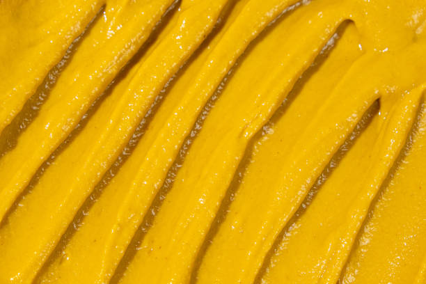 istock Macro Texture Mustard Sauce, Natural Traditional Spicy Mustard Sauce. 2179315523