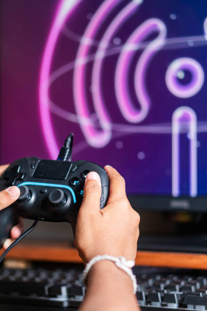istock Gaming with Wireless Controller and Neon Wu-F Symbol 2179320587