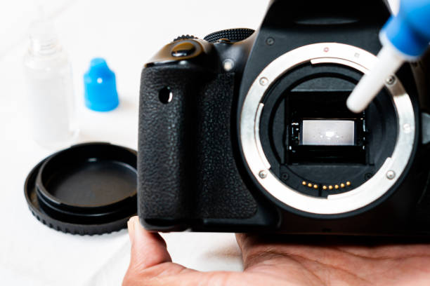istock SLR Camera Sensor Cleaning with Swab 2179320981