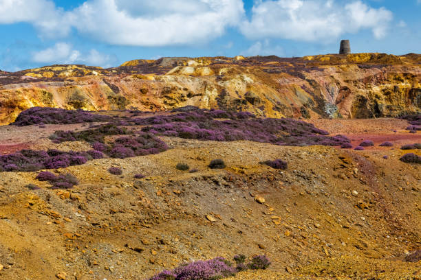 istock Heather-covered rock face on Pary's Mountain in Anglesey, Wales. 2179323283