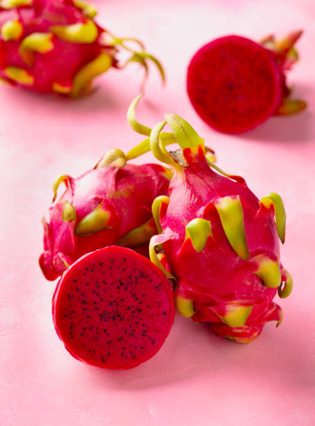 istock Red dragon fruit, pitahaya. Pink background. Close up. 2179326746