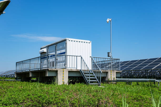 istock Solar power plant control building beside the solar panel 2179359332