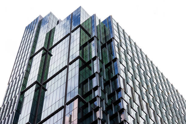 istock Low angle view of modern office building, skyscraper, white background with copy space 2179373082