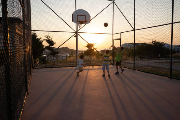 istock Little children playing basketball 2179373280
