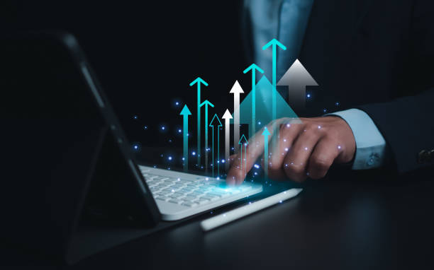 istock Business growth, Progress or success concept, Businessman use tablet showing a growing virtual hologram of analytics dashboard with charts, Stock market, Invest in trading, Finance, Marketing. 2179408892