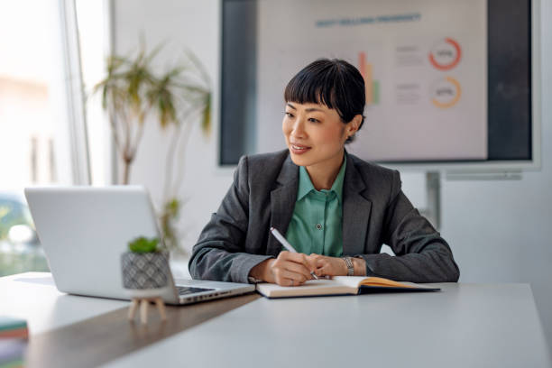 istock Career-driven professional engaged in strategic planning 2179415373