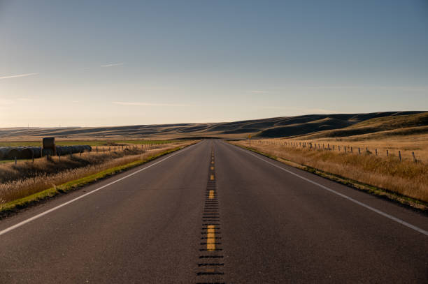 istock Highway heading into the badlands 2179418761