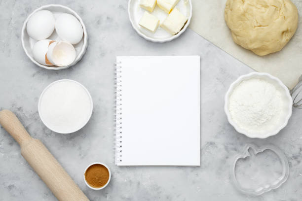 istock Ingredients for baking cookies for Halloween, notepad mock-up for writing down the recipe. Seasonal autumn baking 2179424177