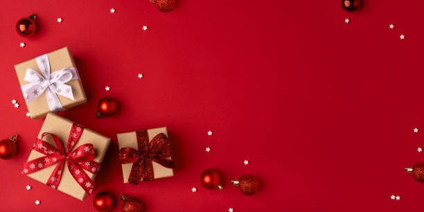 istock Christmas gift boxes with red balls. 2179427905