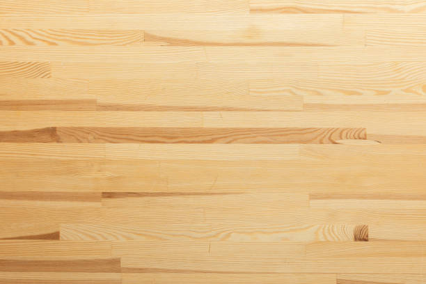 istock A minimalist wooden texture backdrop, offering soft tones and a clean surface for creative design, top view, copy space 2179430492