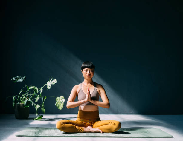 istock Peaceful Meditation With Yoga Pose in Minimalist Setting 2179438434