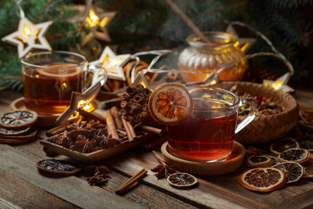 istock Christmas herbal tea with ingredients on a old wooden table. 2179444255