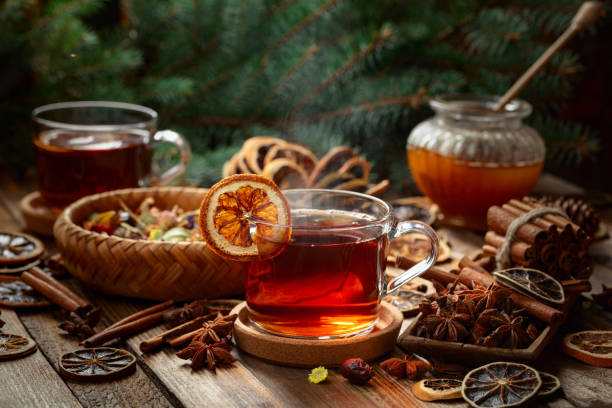 istock Christmas herbal tea with ingredients on a old wooden table. 2179444261
