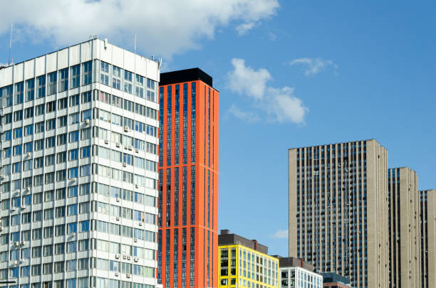 istock modern high-rise buildings with different architectural styles against background of clear blue sky. 2179447752