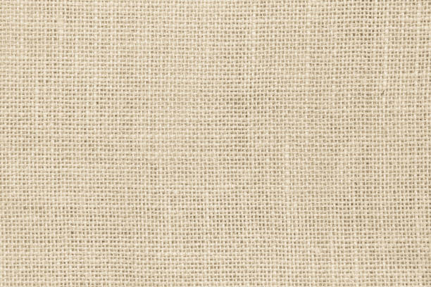 istock Brown sackcloth woven texture background in natural pattern. Jute hessian burlap, linen background in light beige cream color blank. Weaving canvas fiber line cotton cloth textured as organic. 2179469672