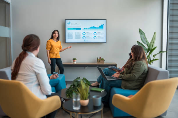 istock Professional Hispanic Woman Leads Corporate Presentation 2179470785