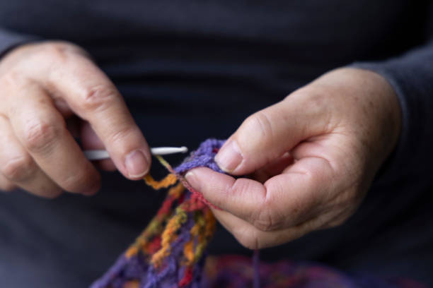 istock Woman Knitting 2179481491
