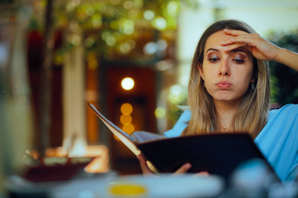 Puzzled Woman Reading Restaurant Menu Being Indecisive