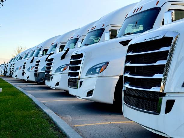 istock white trucks parking in the parking lot 2179491173