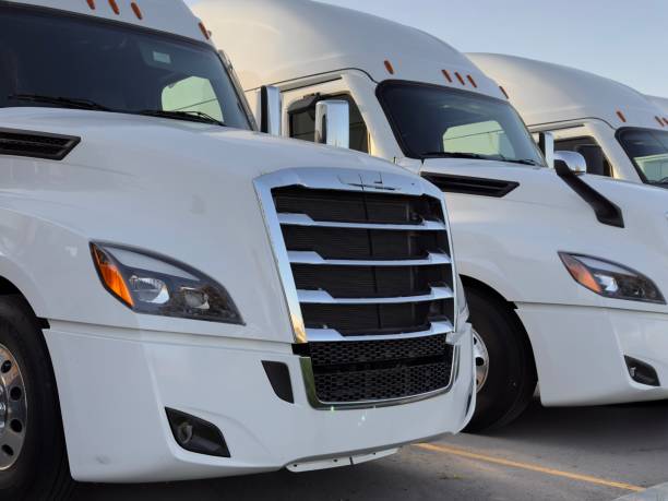 istock white trucks parking in the parking lot 2179491174