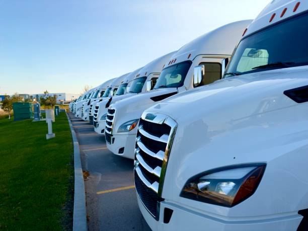 istock white trucks parking in the parking lot 2179491181