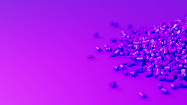 istock Closeup side view on violet plastic polypropylene granules heap on violet backdrop with shallow DOF, masterbatch polymer grain pile. HDPE or PVC resin pellets. 3d render illustration 2179500563