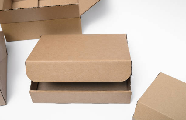 istock Cardboard boxes in different sizes on white background, isolated paper shipping packaging 2179507222