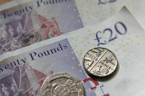 UK pound money British currency banknotes coins