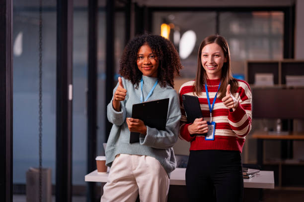 istock Two women discuss, discuss, work on presenting new project ideas, analyze marketing plans and business investments to make it successful. 2179509547