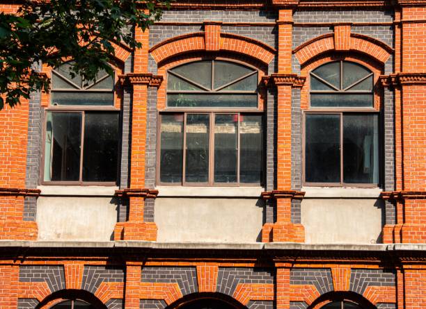istock Historic Brick Building Facade with Large Windows 2179509972