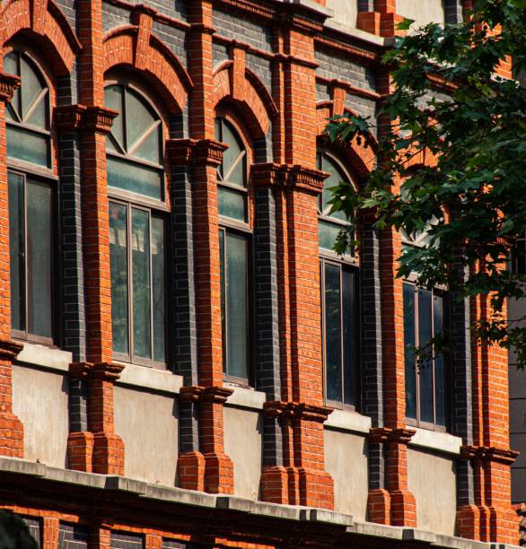 istock Historic red brick building with arched windows 2179509974
