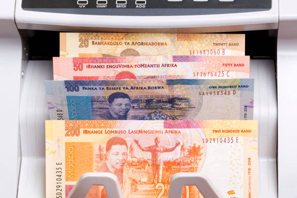 istock South African money in the counting machine 2179511666