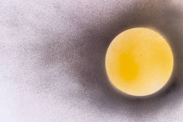 istock Black and yellow background painted with spray paint 2179515870