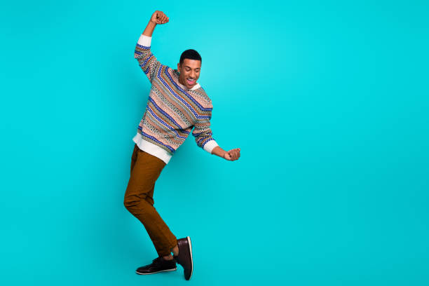 istock Full body portrait of nice young man dancing empty space ad wear pullover isolated on turquoise color background 2179530152