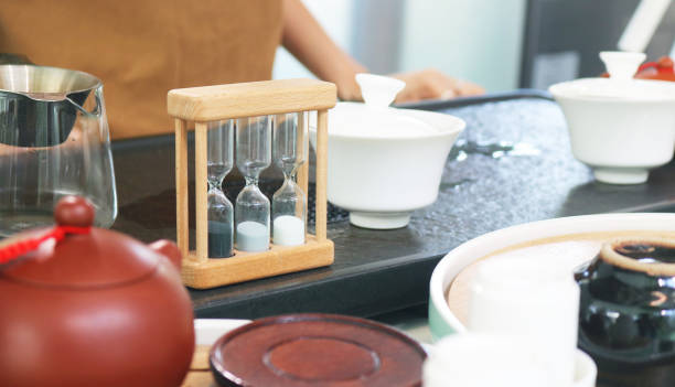 istock Wooden hourglass one, three, five minute timer for process of making tea. 2179539810