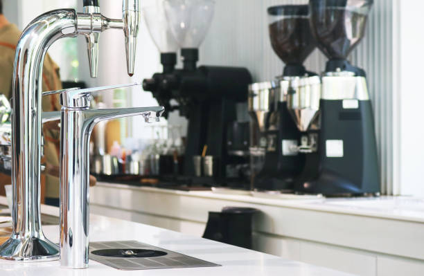 Single handle chrome sink faucet for cafe and bar.