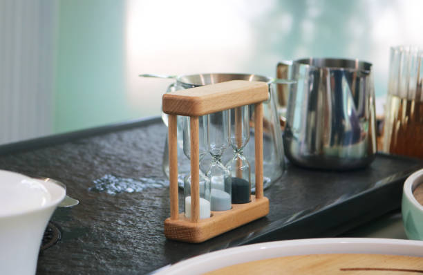 istock Vintage wooden hourglass on make tea counter. 2179539977