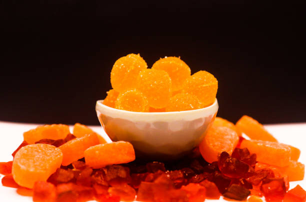 Black background me testy colorful candy and jelly
