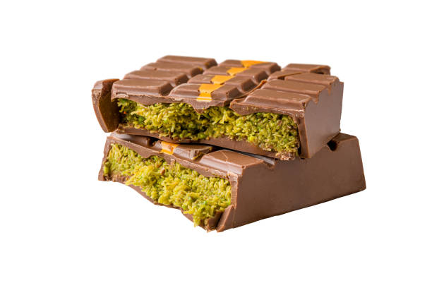 istock Dubai Chocolate bar with green kadayif and peanut butter on white background 2179551909
