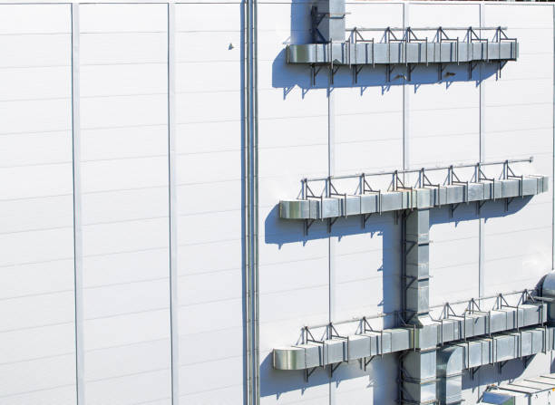 istock factory exterior facade metallic frame walls with pipes industrial architecture background perspective view 2179554152