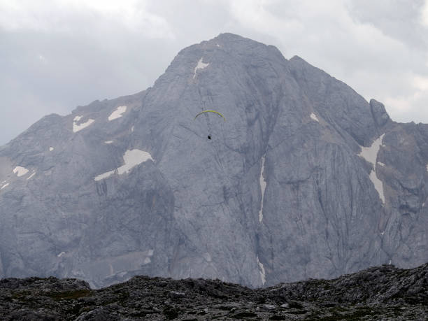 istock paragliding in dolomites marmolada glacier 2179555991