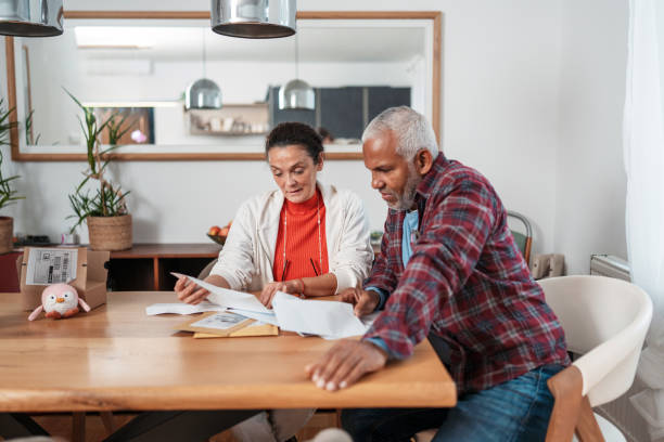 istock Diverse Couple Managing Home Budget Together 2179567107