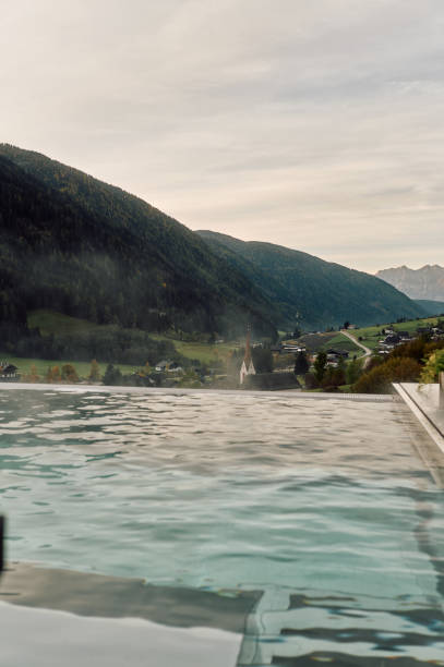 istock Outdoor hot pool with Dolomites mountain views 2179567400