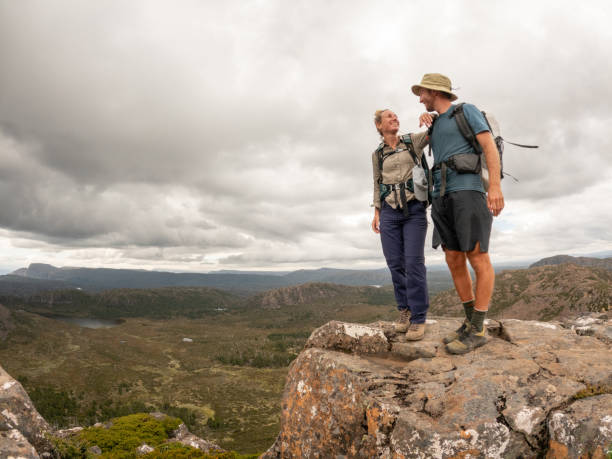 istock Happy Couple Enjoying Mountain Hike 2179569349